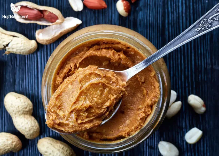 طرز تهیه کره بادام زمینی: دانه‌های بادام زمینی را در غذاساز بگذارید